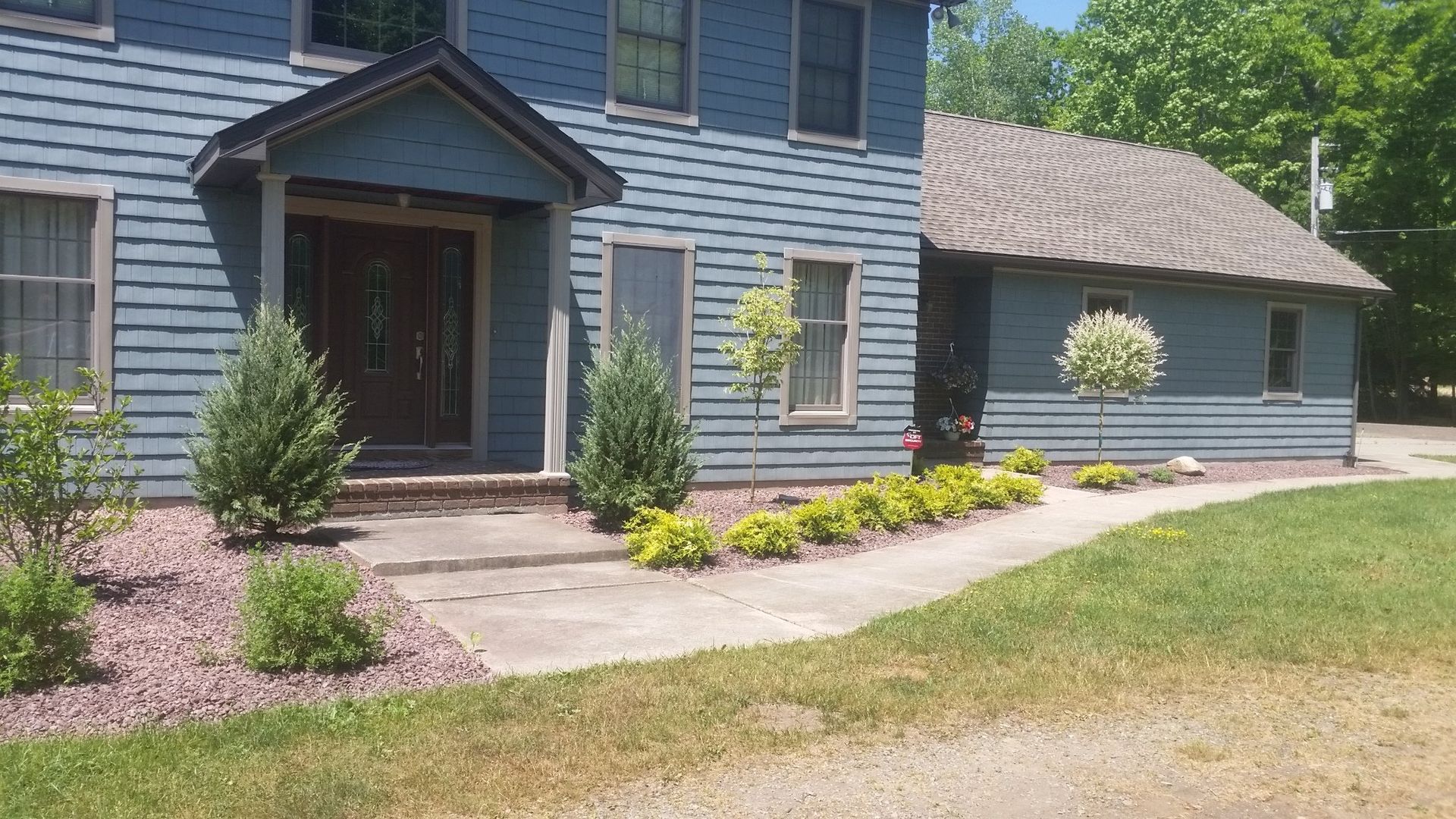 front right side of house with landscaping