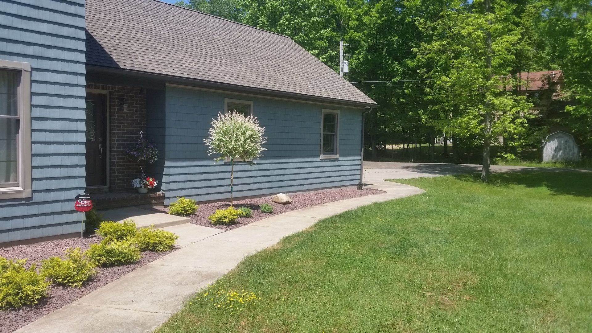 side of house with landscaping