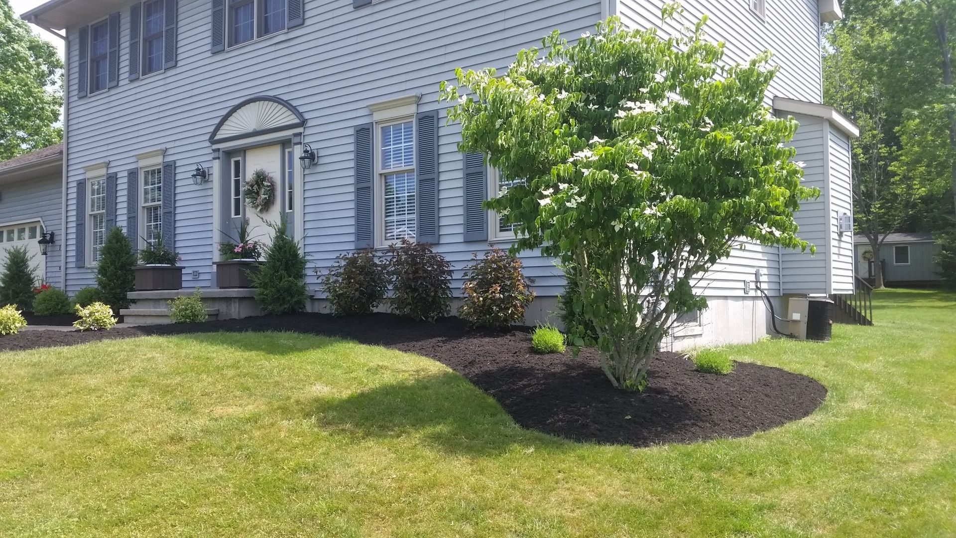 finished landscaping looking at front of house