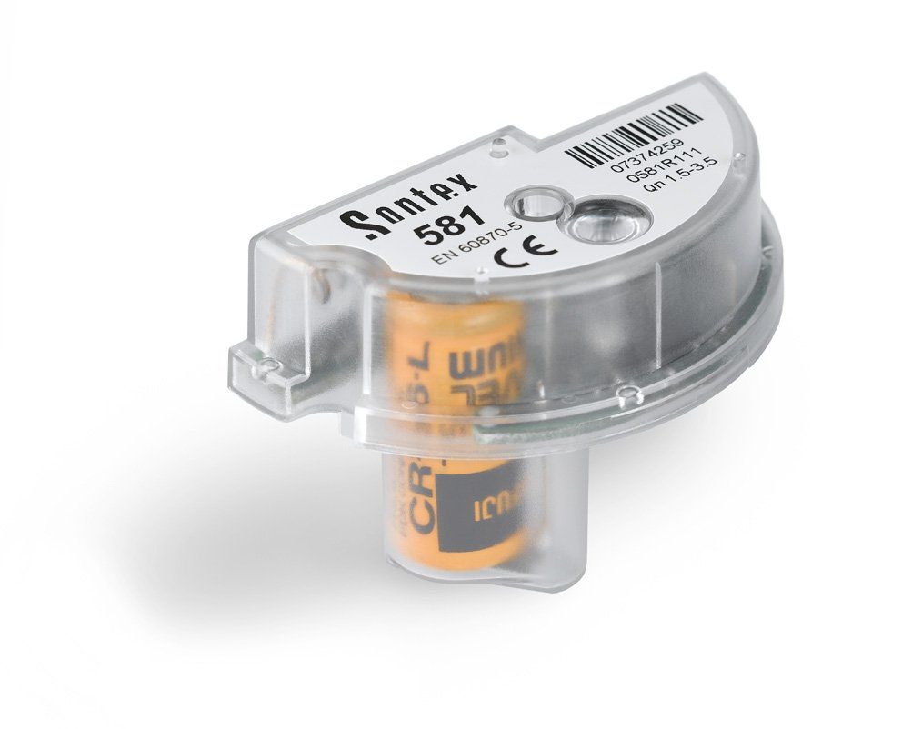 Santex 581 Energiemessgerät mit CR17450 Batterie in einem durchsichtigen Kunststoffgehäuse.