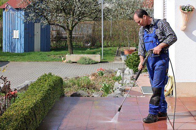 Pressure Washing the Concrete Flooring — Naples, FL — Cope's Painting Of Naples, Inc.