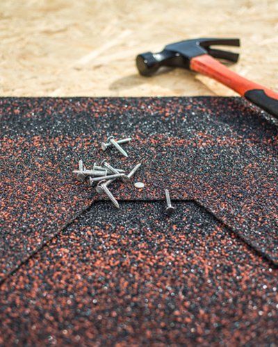 Roofing Services — Shingles And Hammer And Nails in Tampa, FL Roofing Services — Shingles And Hammer And Nails in Tampa, FL