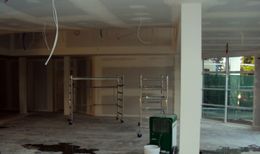 A professional plastering repair underway