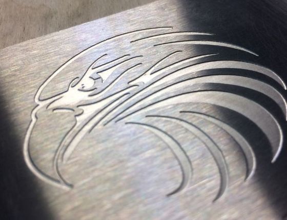 Deep etched metal sign