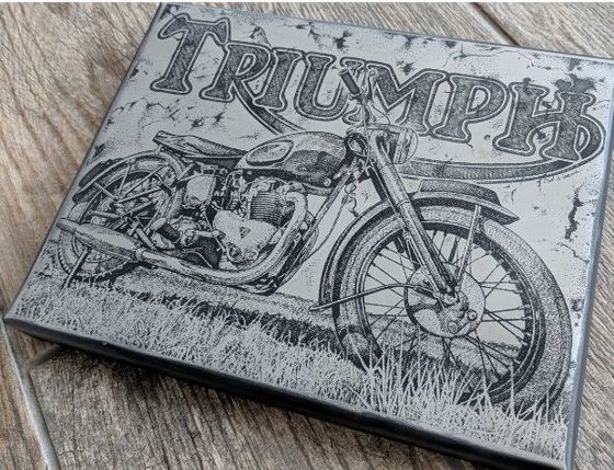 Deep etched metal sign