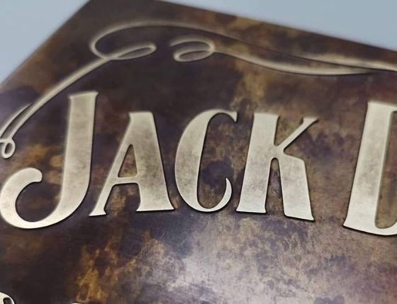 Deep etched metal sign