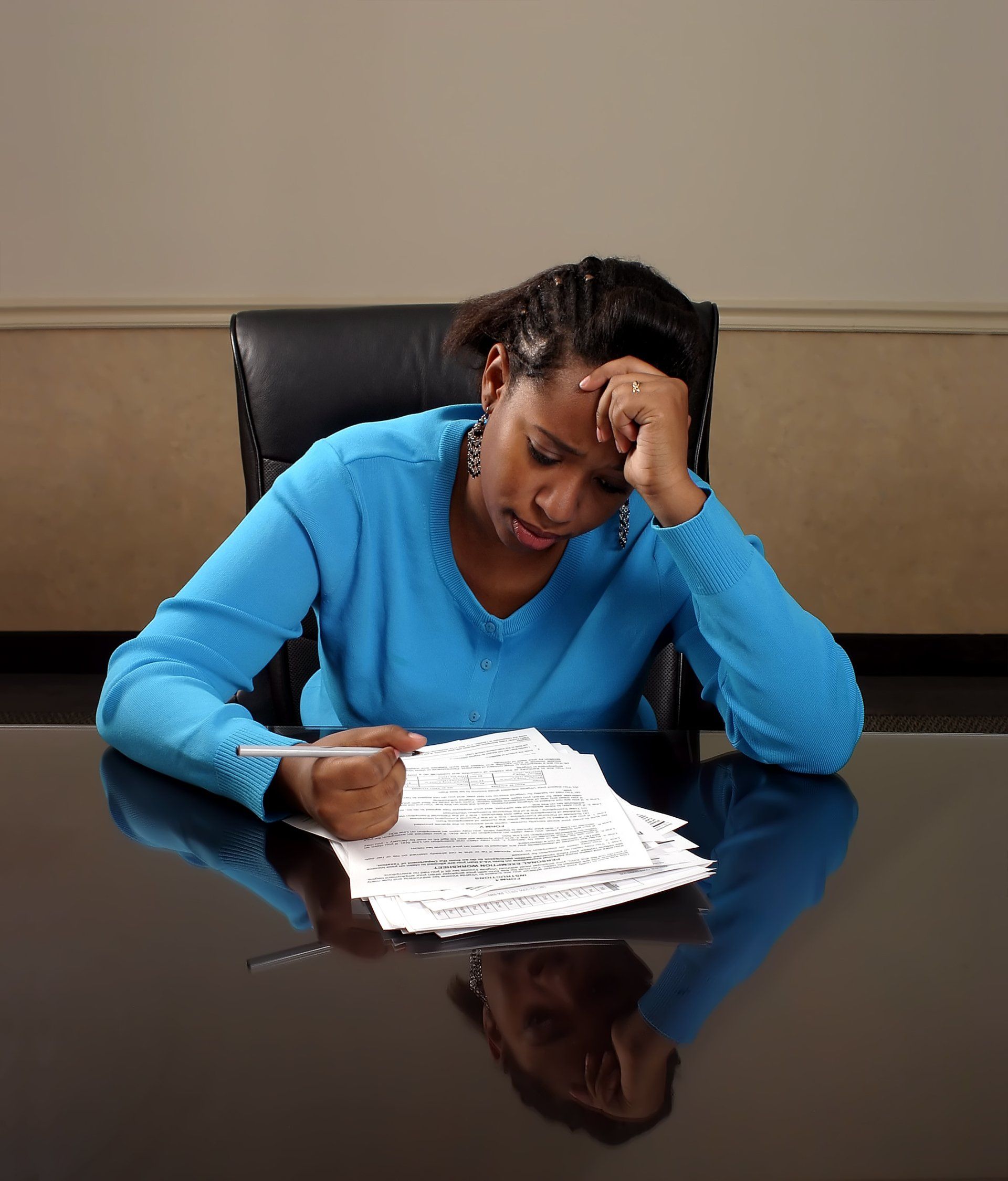 Woman Preparing Home Budget — Dallas, TX — Dynamic Customize Tax