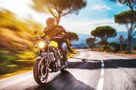Motorcycle in the Road — Insurance Services in Palm City, FL Motorcycle in the Road — Insurance Services in Palm City, FL