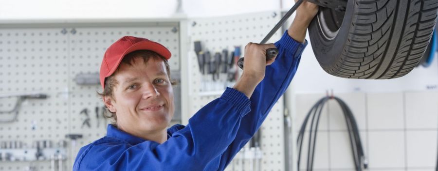 A mechanic working on a motor repair in Noosaville