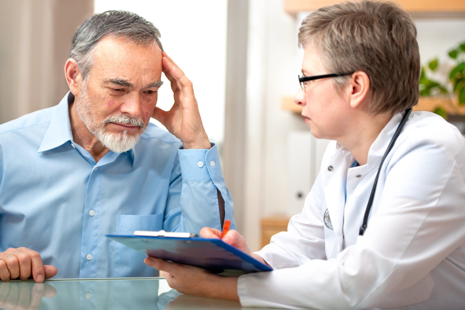 Development Issues — Man Talking To His Doctor in Torrance, CA Development Issues — Man Talking To His Doctor in Torrance, CA