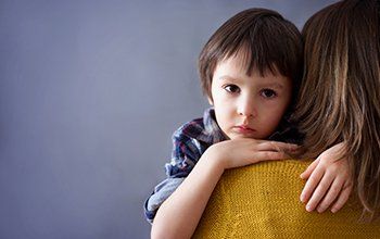 Art & Play Therapy — Sad Child Hugging His Mother in Torrance, CA
