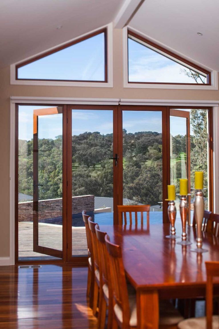 Security Screen Door in Dining Area — Glass & Aluminium Windows & Doors In Yeppoon, QLD