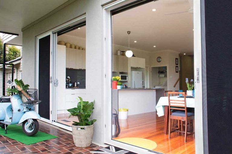 Security Screen in Dining Area— Glass & Aluminium Windows & Doors In Yeppoon, QLD