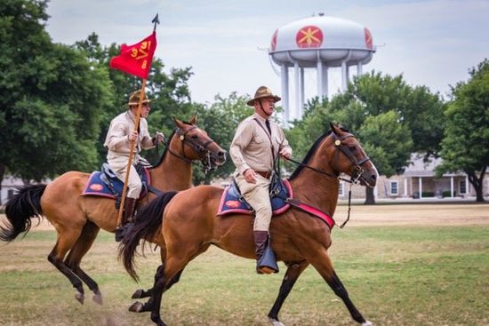 Men riding horses