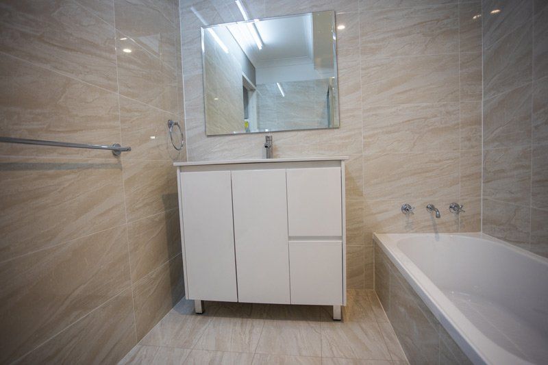 bathroom with cream walls