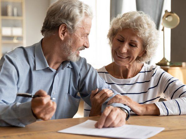 70s Couple Discuss Agreement — Ranch Cucamonga, CA — The Law Offices of Priscilla Solario
