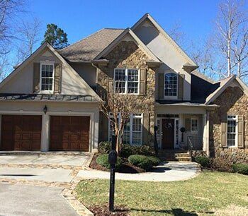 White House with Stone Textured Wall — Construction contractors in Cleveland, TN White House with Stone Textured Wall — Construction contractors in Cleveland, TN