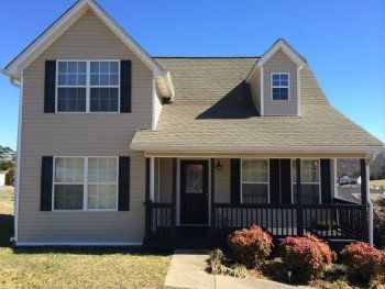 Brick House Construction with Wooden Frame Structure — Construction contractors in Cleveland, TN Brick House Construction with Wooden Frame Structure — Construction contractors in Cleveland, TN
