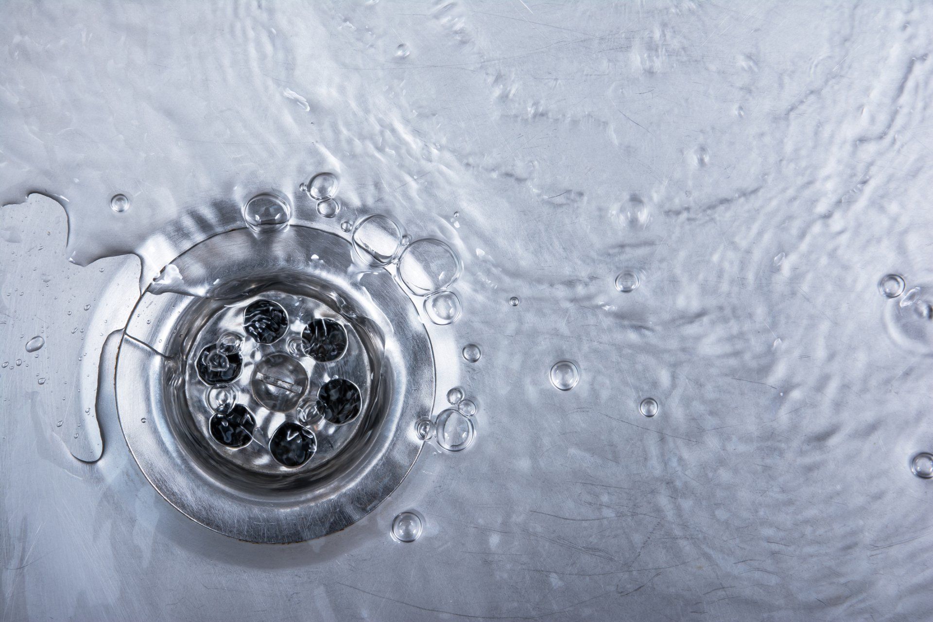 Plumbing Services — Removing Clog In The Sink in Church Road