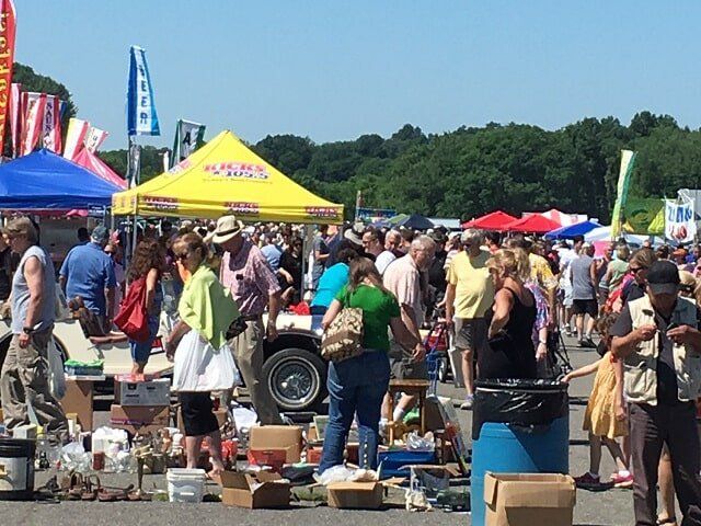 Flea Market Vendors — People Selecting Products from the Yard Sale in Stormville, NY Flea Market Vendors — People Selecting Products from the Yard Sale in Stormville, NY
