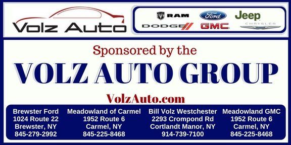 An ad for volz auto group sponsored by dodge gmc and ford