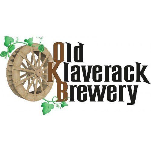 A logo for old klaverack brewery with a water wheel and hops.