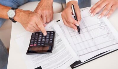 People Going Over Taxes - Tax Services in Garden Grove, CA