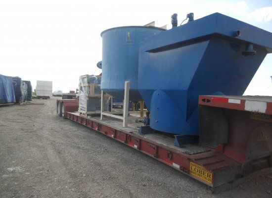 Oversized load carriers moving heavy equipment