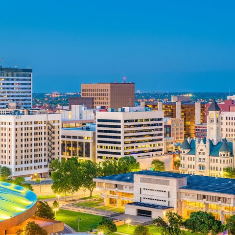 Wichita, Kansas, USA downtown skyline at dusk.