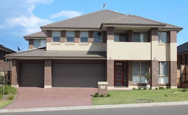traditional house with new garage door