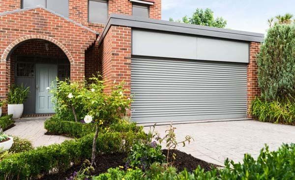 house with metal garage door