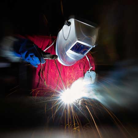 man in welding mask, welding