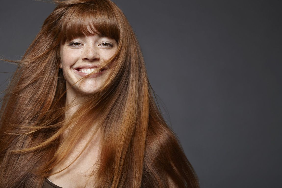 portrait of young woman with long brown hair