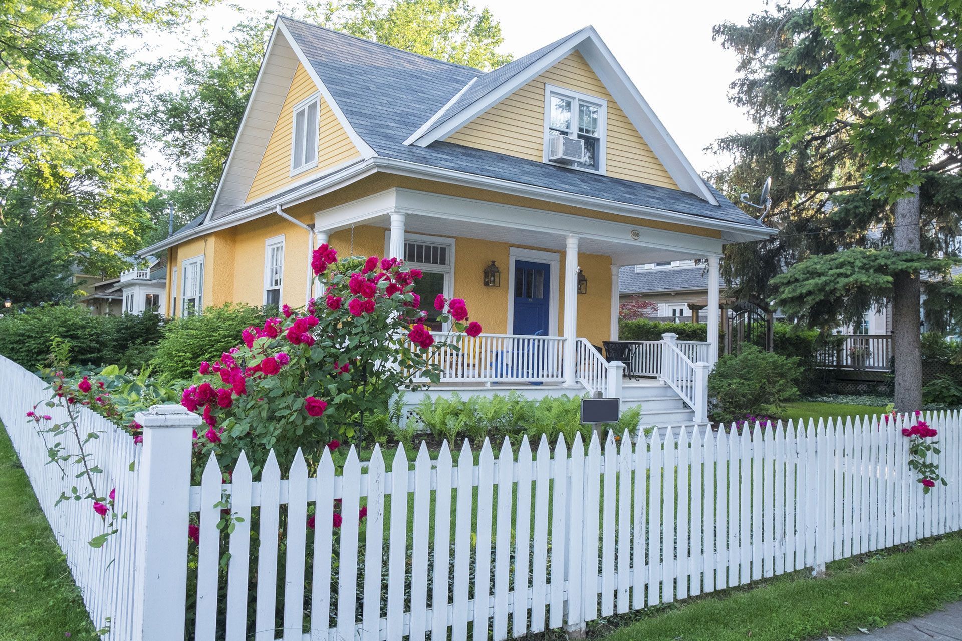 residential house with white fencing