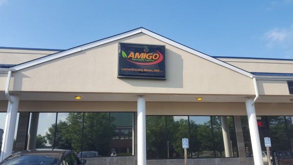 A building with a sign that says amigo on it