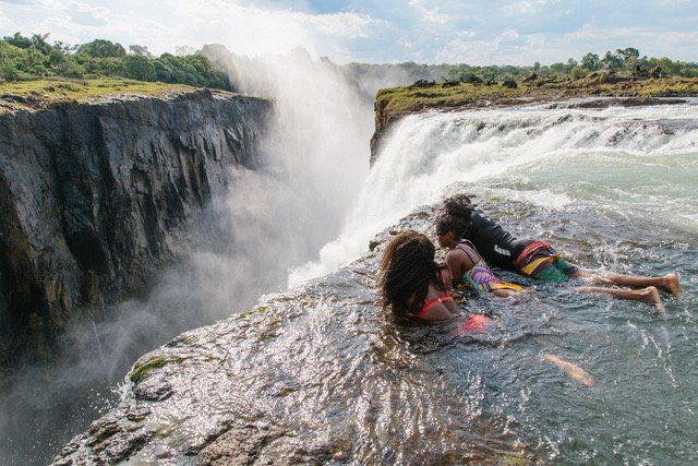 Spend time in devil's pool looking down the Victoria Falls
