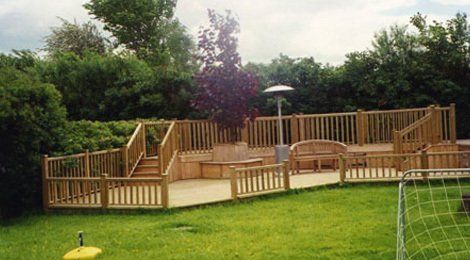 large decing area with steps and handrails