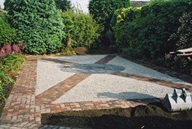 patio with saltire design in brick
