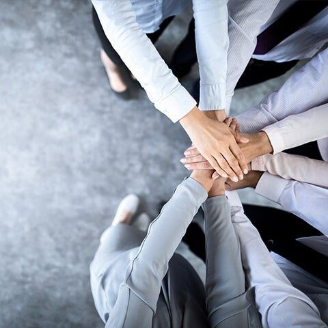 Team Putting Their Hands Together — Auditing & Compliance in Manoora, QLD