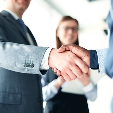 Man Shaking Hands — Auditing & Compliance in Manoora, QLD