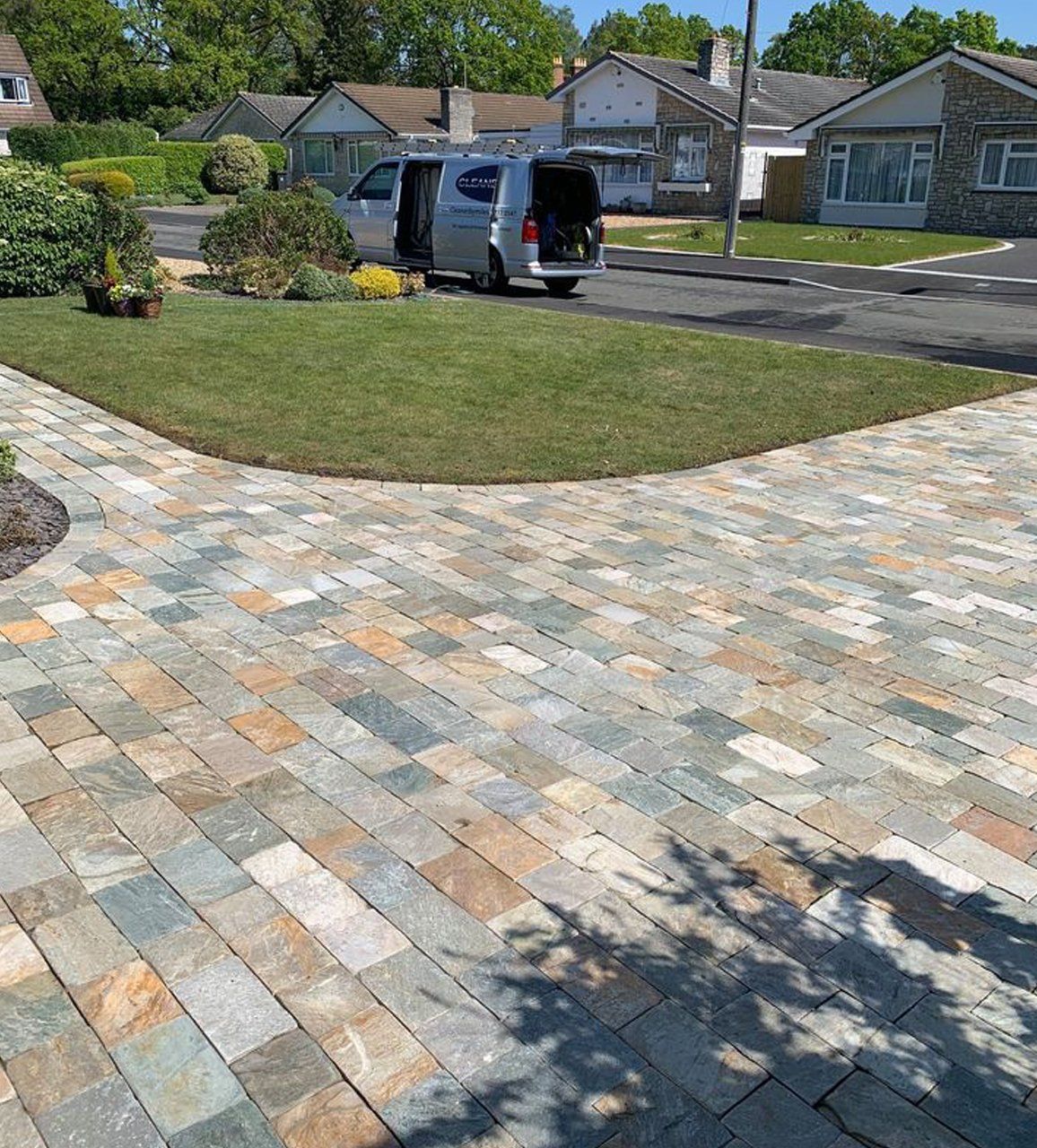 Cleaner by Miles driveway after image 06