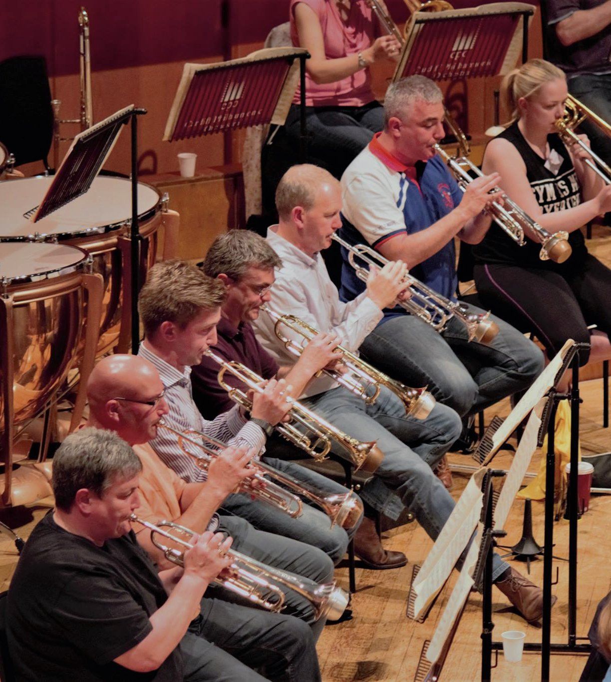 Six trumpet players in action