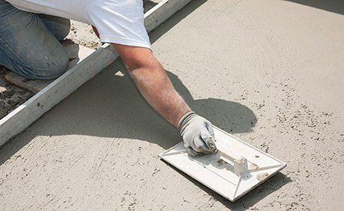 Concrete — Ready mix concrete that's being finished in Wilmington, NC Ready-mix products being used in Wilmington, NC