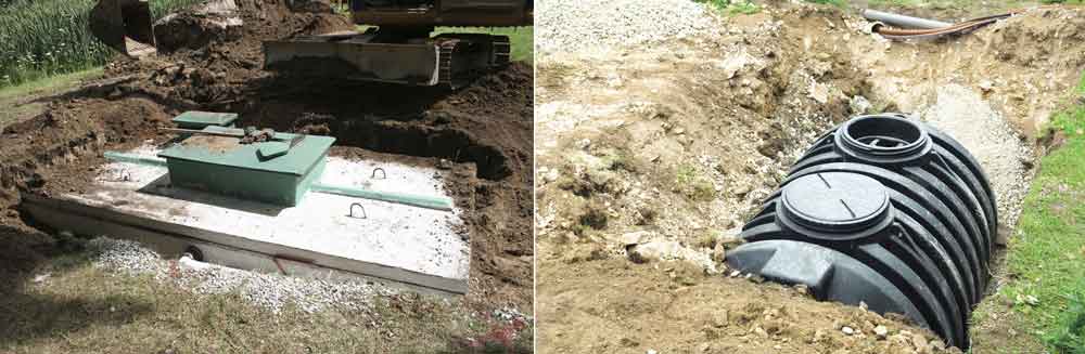 Two septic tanks, one green, one black, installed in a trench. Dirt surrounds both.