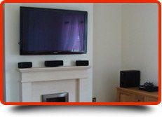 If you're looking for plastering work in Plymouth call 01752 368 601 Living room with plastered walls and a TV on the wall