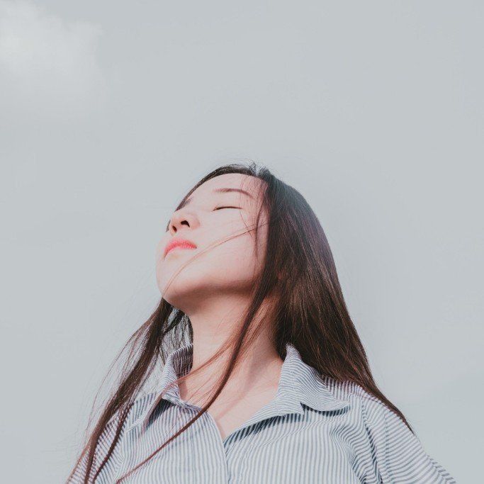woman breathing deeply