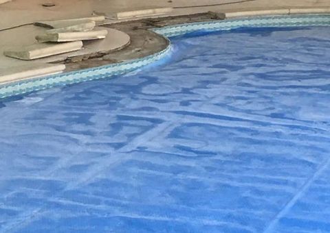 Swimming pool tiling