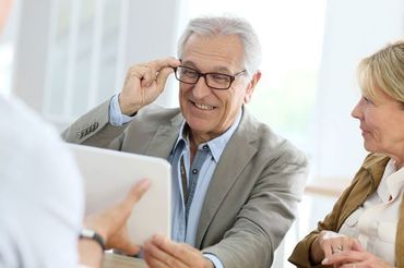 Senior man trying new eyeglasses