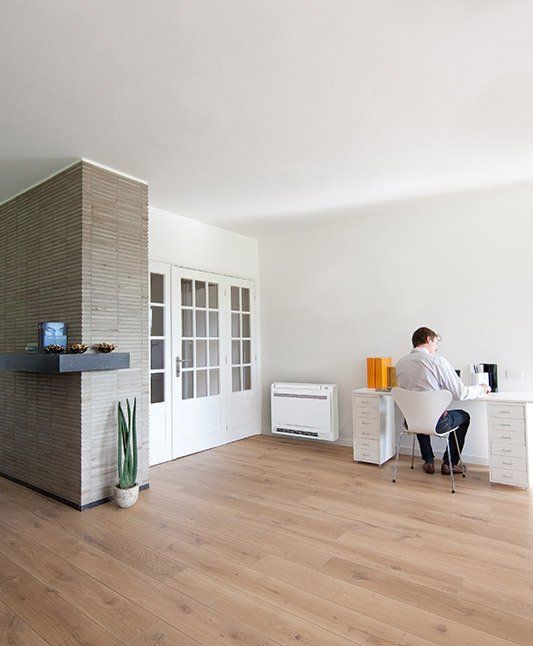 Floor console heat pump in home office