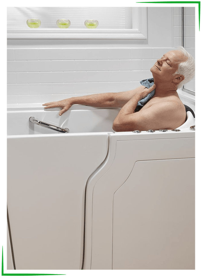 Walk-In Tubs - Missouri Bath & Window - Springfield, Missouri An elderly man relaxes in a white walk-in tub, sunlight on his face. He has white hair and holds a towel.
